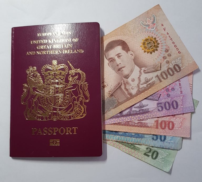 picture of Passport and Thai Bank Notes