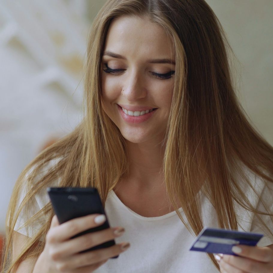 photo of woman using smart phone to search interne
