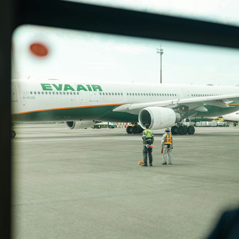 image of an EVA plane on the tarmac