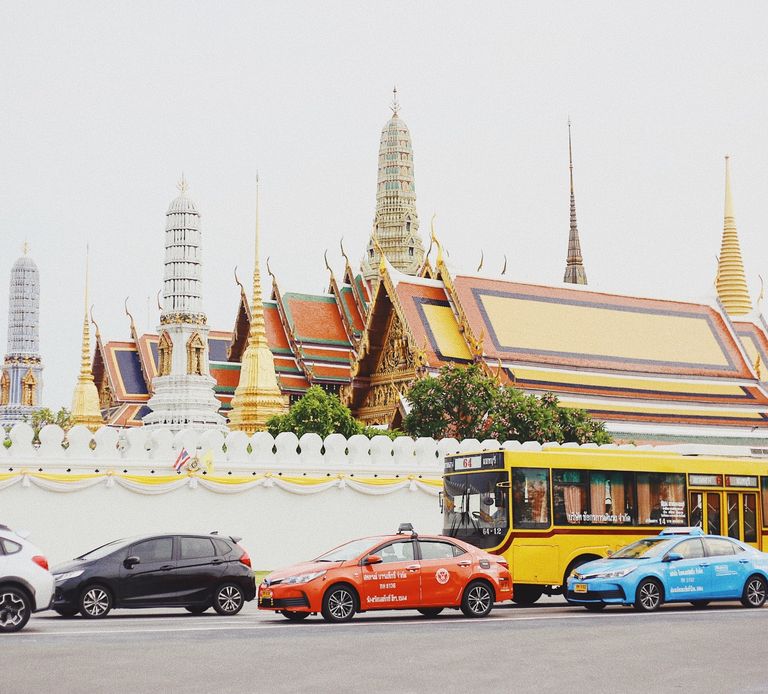 Picture cars outside a Thai Temple