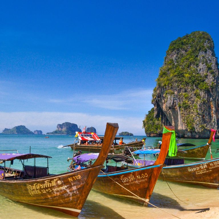 image of boats on a Thai beach